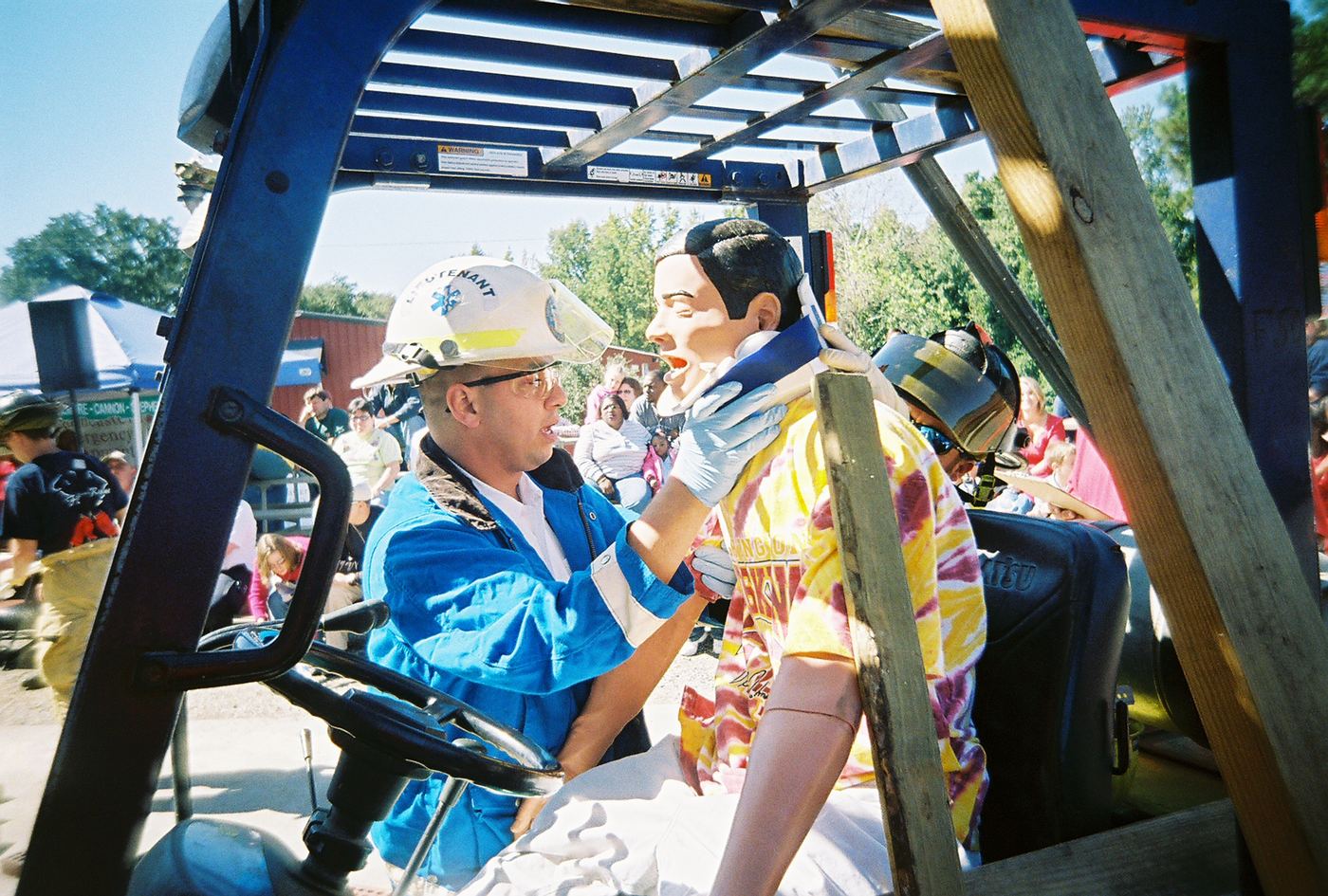 A medic working an airway on a manikin in a forklift in Sumter, 2006
