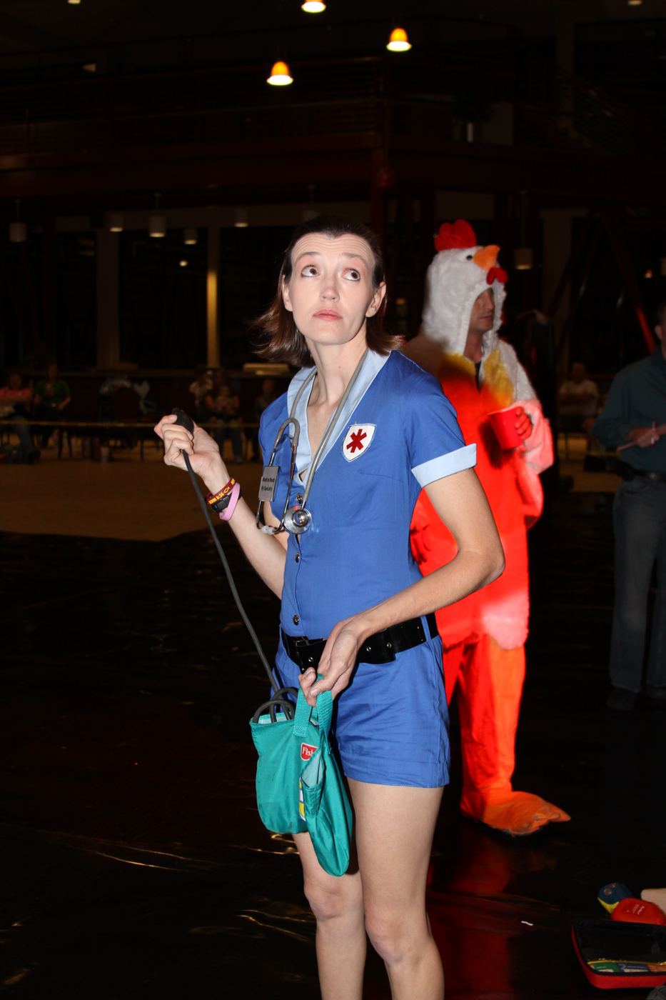 A person in scrubs standing in the scenario room in Florence, 2010